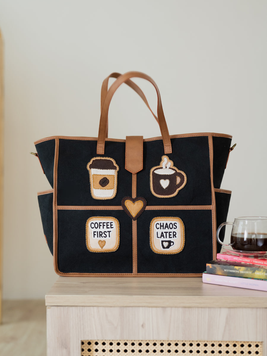The Coffee Run Tote - Jet Black & Warm Tan - Side angle and strap detailing | DilliBagCo