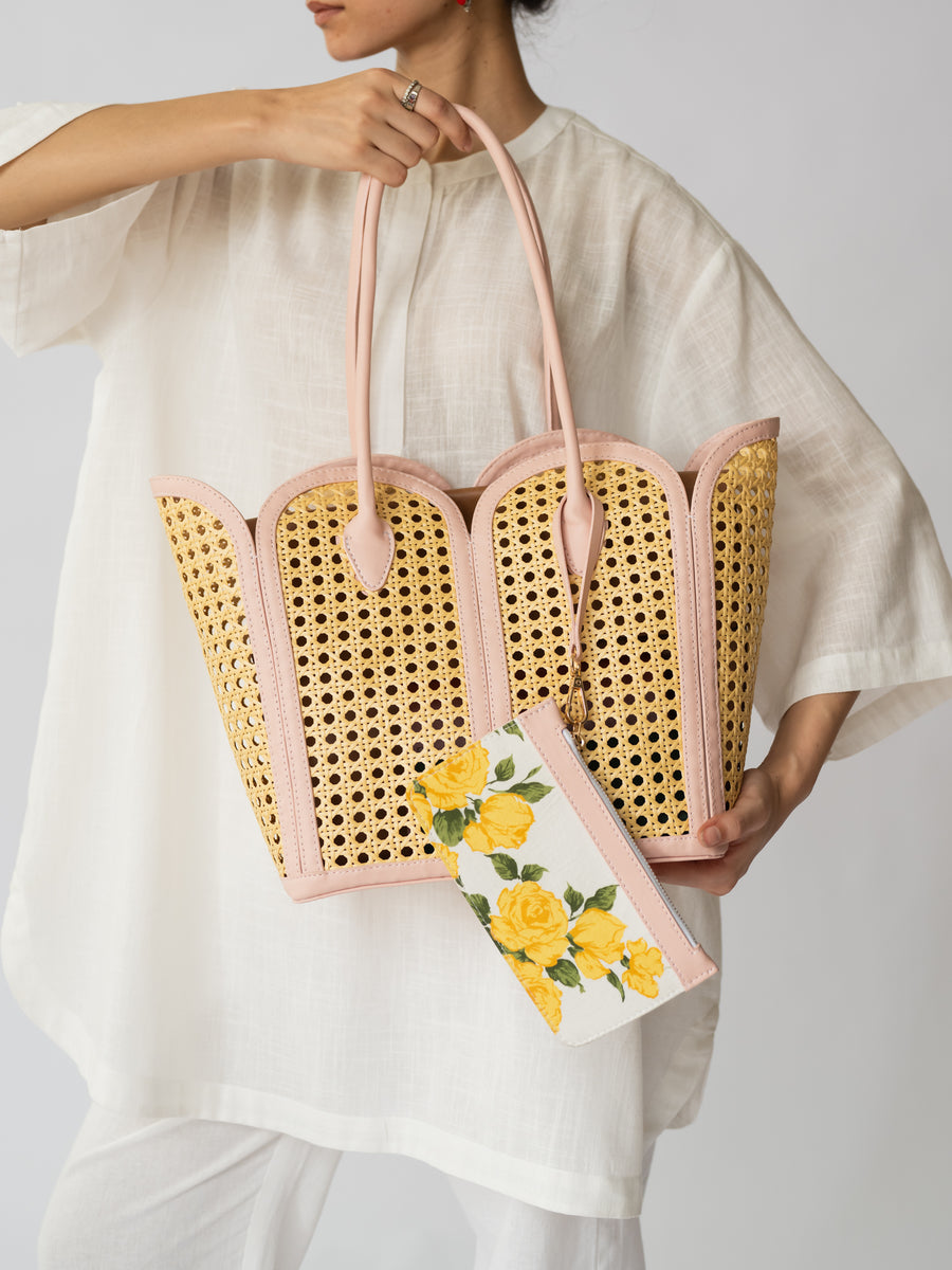 The Petal Cane Tote - Natural Cane & Blush Pink - Side angle and strap detailing | DilliBagCo